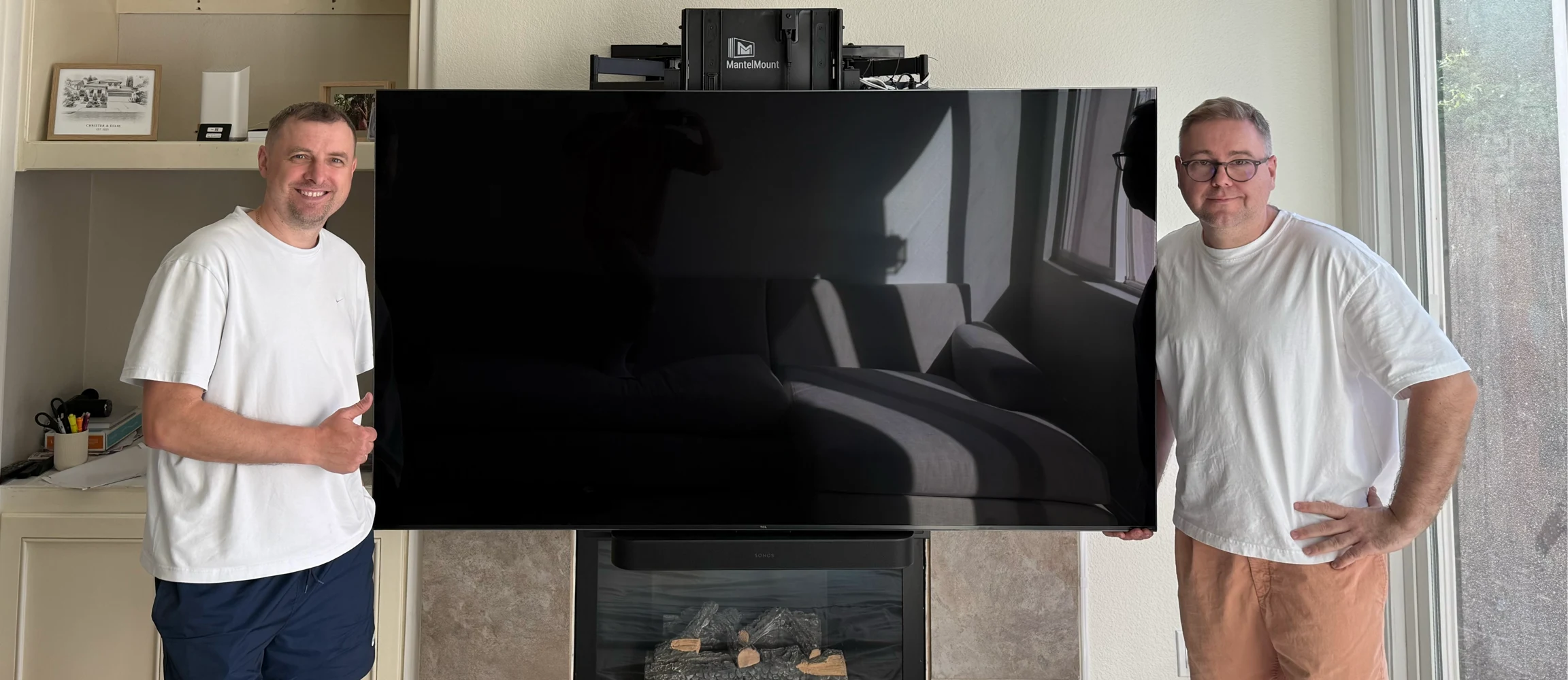 ProMount professional TV installation team with MantelMount above fireplace in Sacramento
